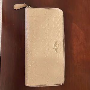 Coach patent leather accordion zip wallet. Like new condition.